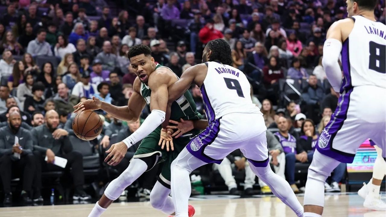 Giannis Antetokounmpo défendu par Achiuwa